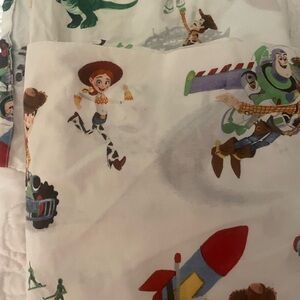 Toy Story crib fitted and top sheet